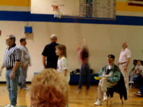 Asya represented her school in her age group for a hoop shooting competition